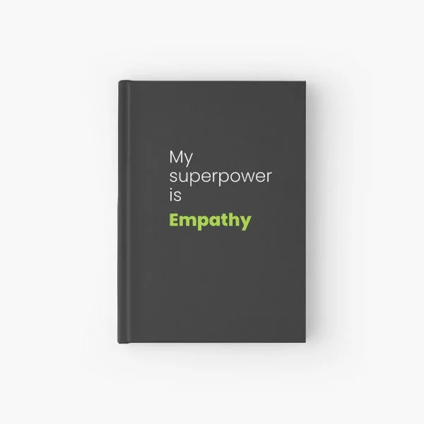 A hardcover journal with the phrase "My superpower is empathy" in white and green letters.